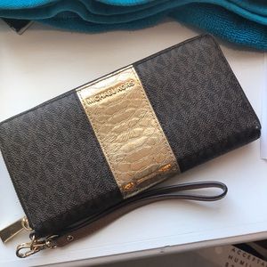 Brown/gold pattern Michael Kots Wallet wristlet